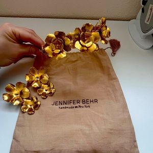 Headband and earrings. Can be sold separately. Color is gold, wore one time